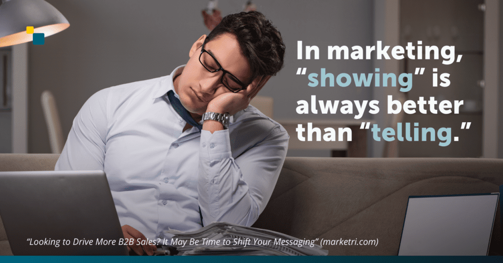 Image of a tired man falling asleep on his sofa with his laptop and a stack of papers in his lap. Quote on the image reads "In marketing, “showing” is always better than “telling.” "